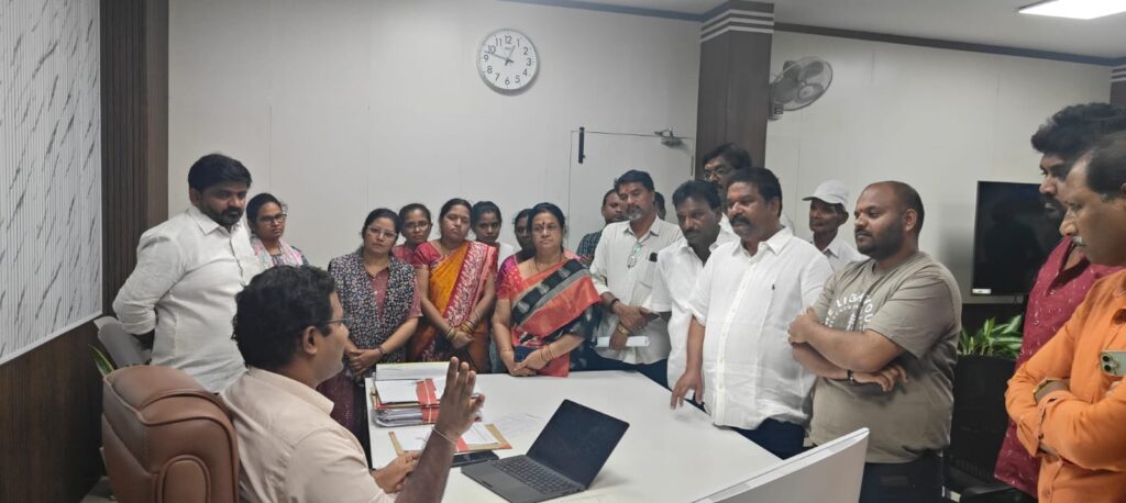 Geedi Charanjith Goud with residents submitting petition against illegal cell tower in SP Nagar